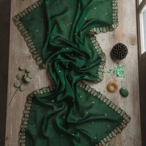 [gptPrompt]Write a catchy, SEO-friendly e-commerce title for this traditional Indian garment: Emerald Green Organza Dupatta | Gold Scalloped Border Scarf | Indian Wedding Guest Wrap | Festive Ethnic Wear | Synthetic Blend Odhni by KanhaCouture[/gptPrompt]